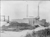 1 vue  - Centrale électrique avant creusement du bassin (décembre 1929). (ouvre la visionneuse)