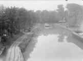 1 vue  - Canal de Huningue vers l\'Ile Napoléon, halage, tracteur électrique sur rails (31 mai 1933). (ouvre la visionneuse)