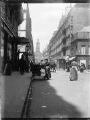 1 vue  - Paris, rue de la Chaussée d\'Antin, au fond l\'église de la Sainte-Trinité, scène de rue [avant 1914]. (ouvre la visionneuse)