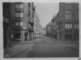 1 vue  - Rue du Fossé des Tanneurs, chemiserie Albert Gillet, commerce \'Au châpeau chic\'. [1939]. (ouvre la visionneuse)