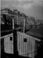 1 vue  - Palais Rohan, côté terrasse vue du quai des Bateliers, bateau lavoir. [1940-1944]. (ouvre la visionneuse)