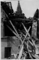 ouvrir dans la visionneuse : Rue des Cordiers, pignon de la maison de l'Oeuvre Notre-Dame suite au bombardement aérien du 11 août 1944.