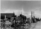 1 vue  - Marckolsheim, rue principale après les bombardements de 1940. 19 juin 1940. (ouvre la visionneuse)